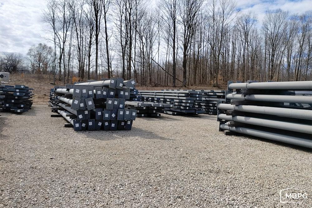 MI1771 Steel Building Parts Sitting on Gravel