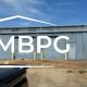 Blue Used Metal Building with Two Roll Up Doors