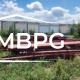 Used Red Iron Materials Loaded on grass